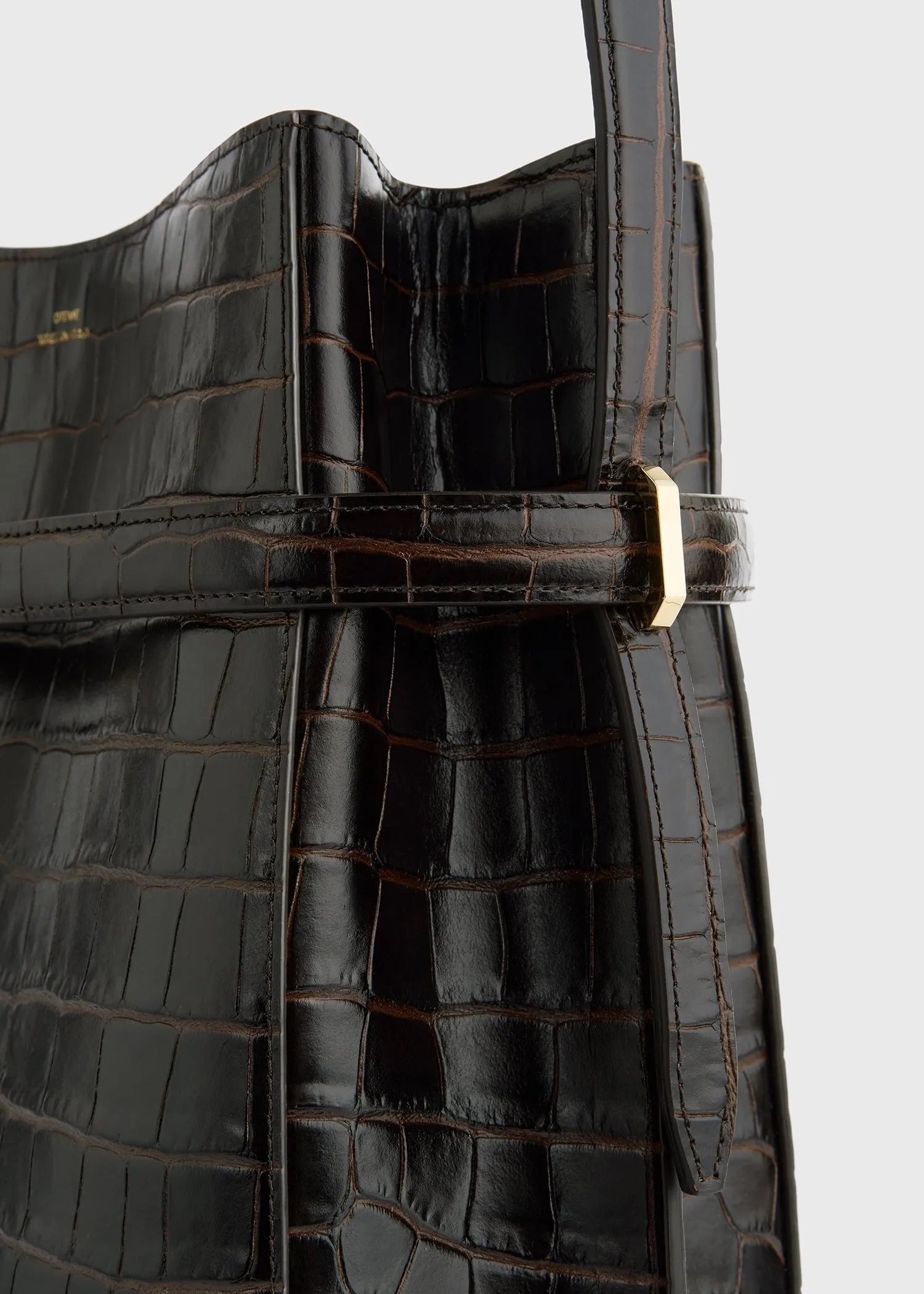 Belted croco-embossed bucket bag dark brown