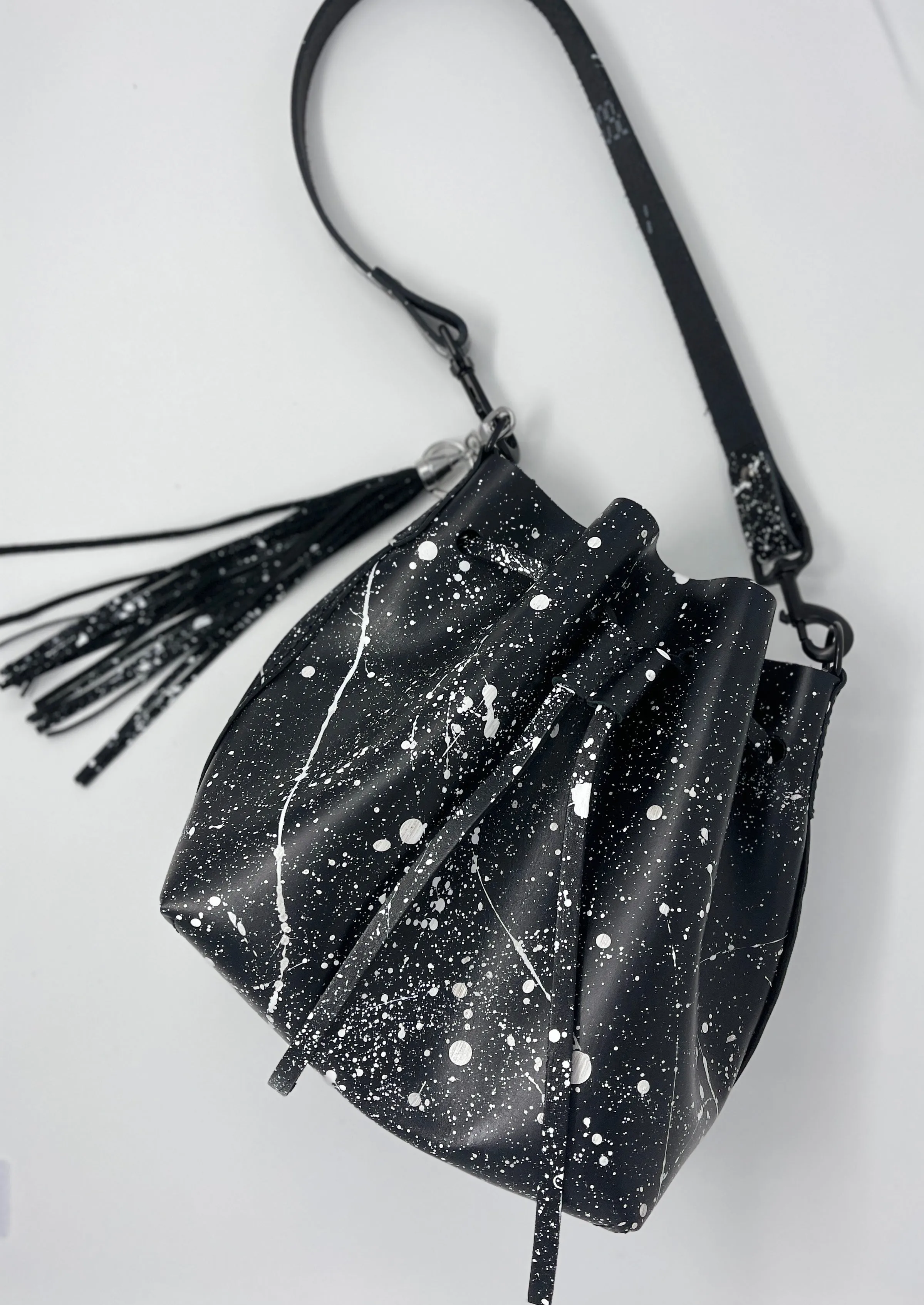 Black Leather Drawstring Bucket Shoulder Bag With Matte White Splatter