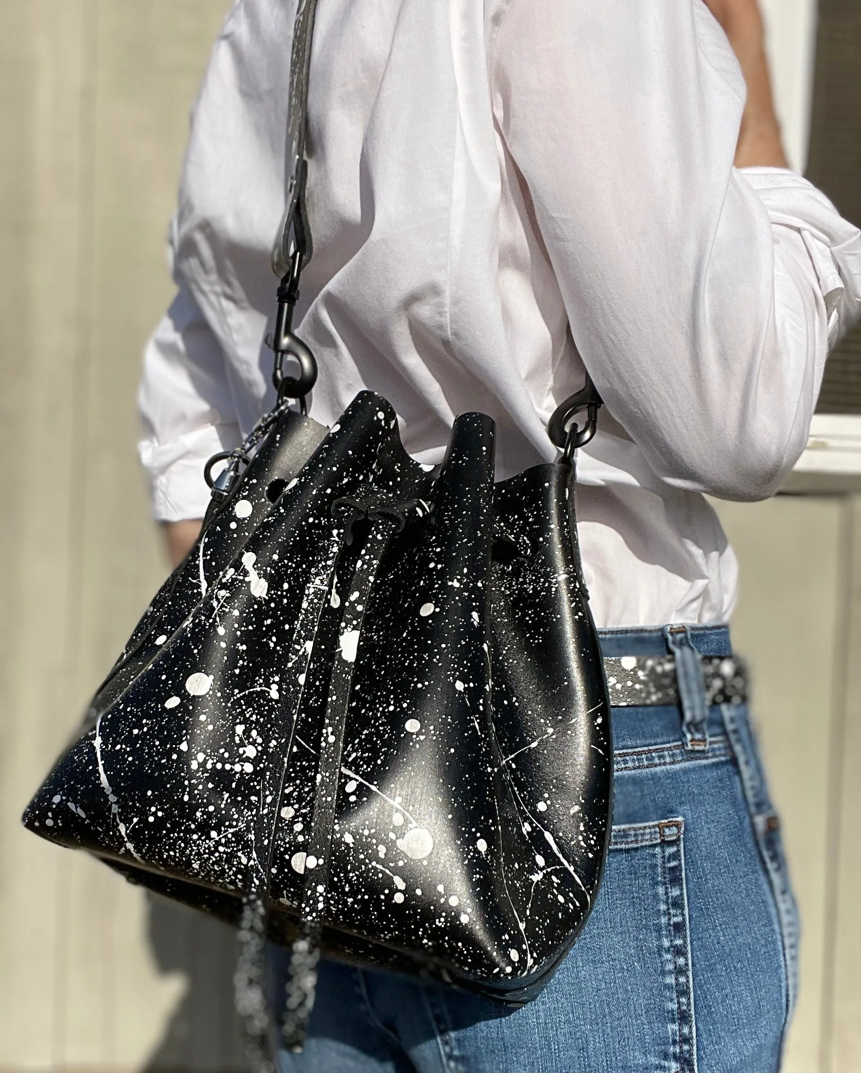 Black Leather Drawstring Bucket Shoulder Bag With Matte White Splatter