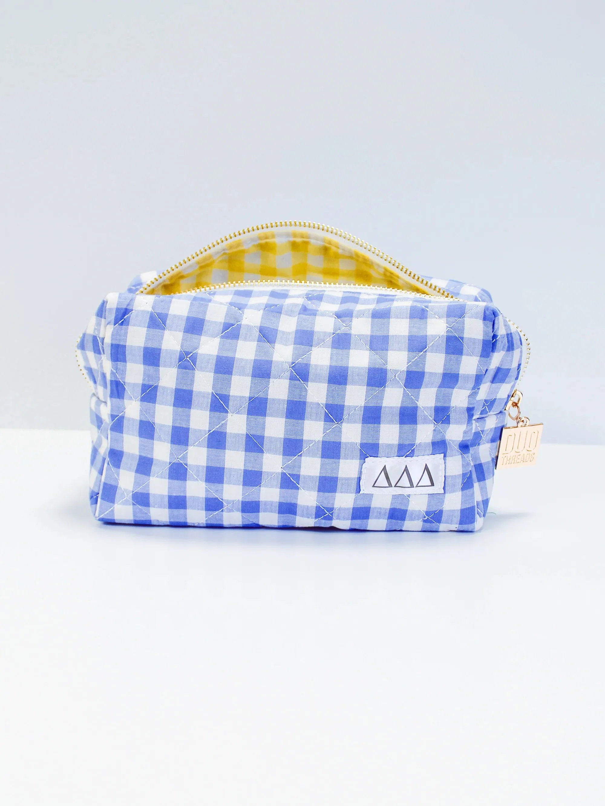 GINGHAM QUILTED MAKEUP BAG | DELTA DELTA DELTA