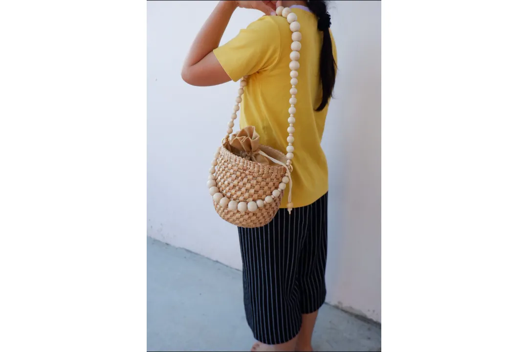 straw bucket bag with wooden bead handle