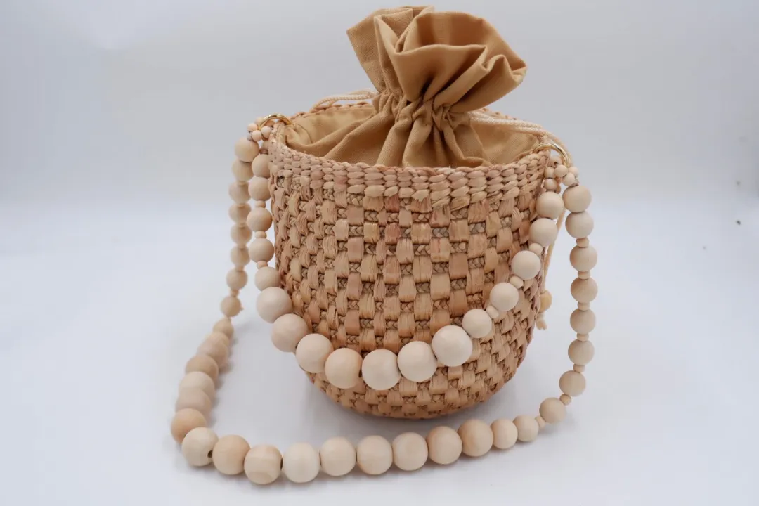 straw bucket bag with wooden bead handle